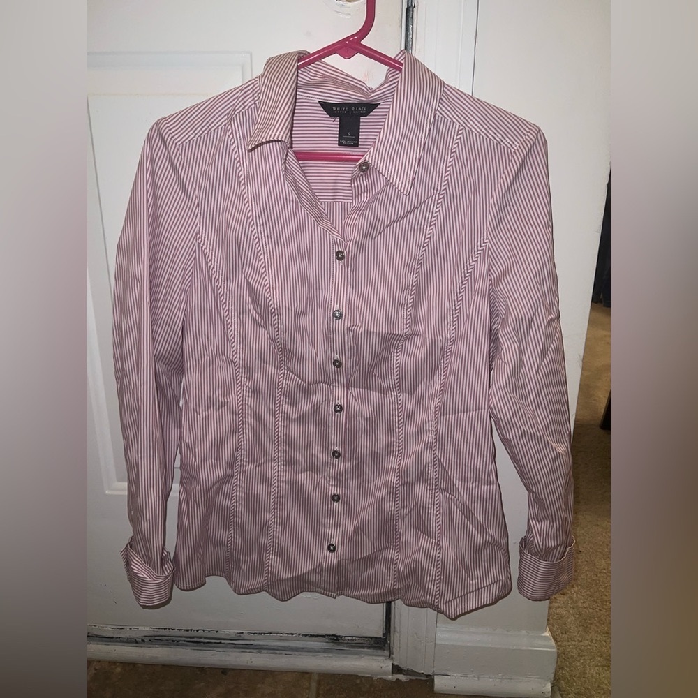 Woman’s pink and white stripped button up top in size 6